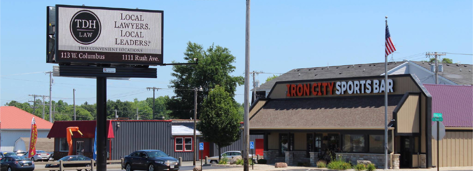 COMSTOR Outdoor digital billboard along a busy commercial corridor