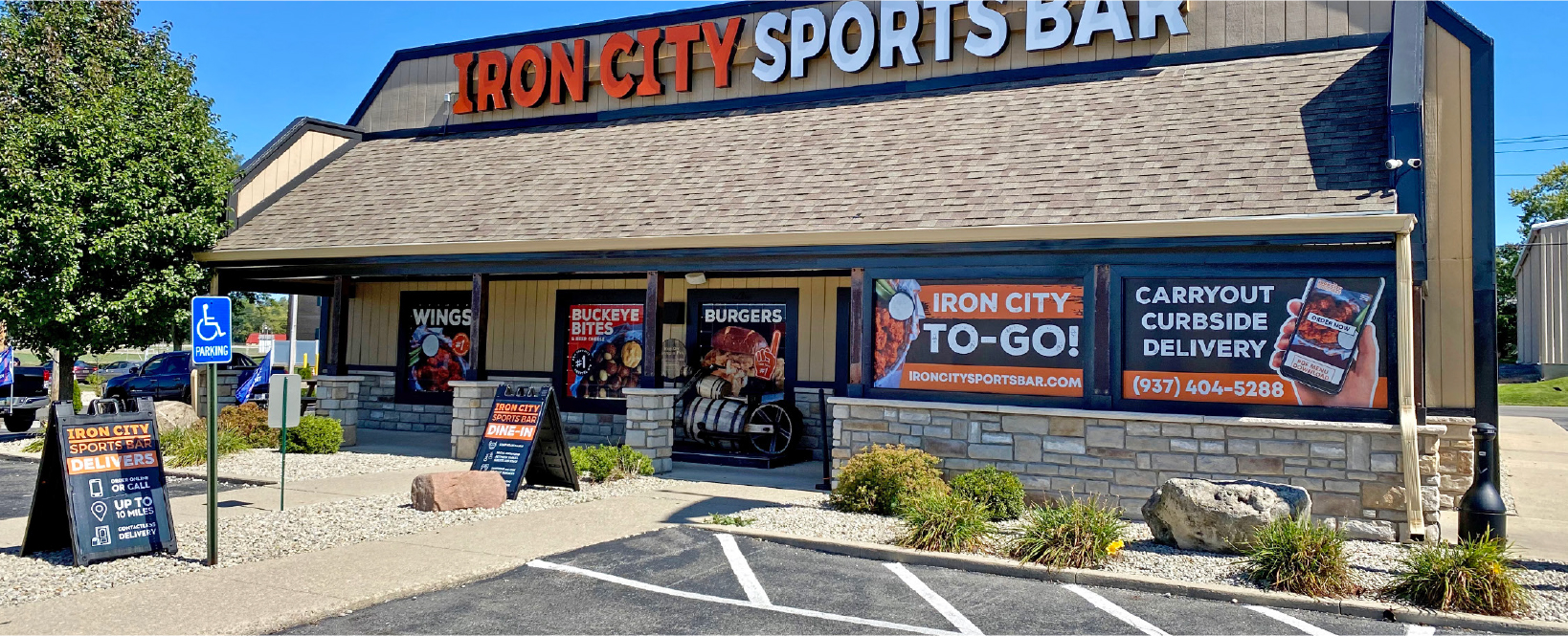 COMSTOR Outdoor promotional signage on a storefront